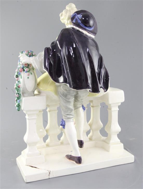 A Keramos Wiener Kunstkeramik pottery group of a courting couple, early 20th century, 36.5cm, damage to plinth base